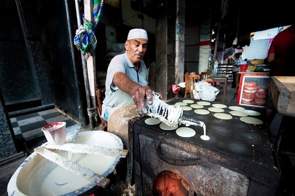 Man works with dough, Egypt