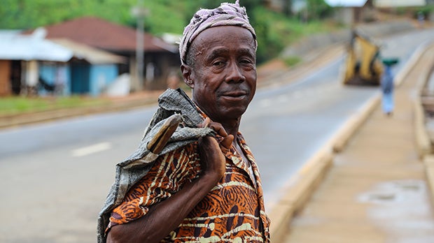 Man on the street in Kailahun, Sierra Leone. Photo by George Lewis, The World Bank.