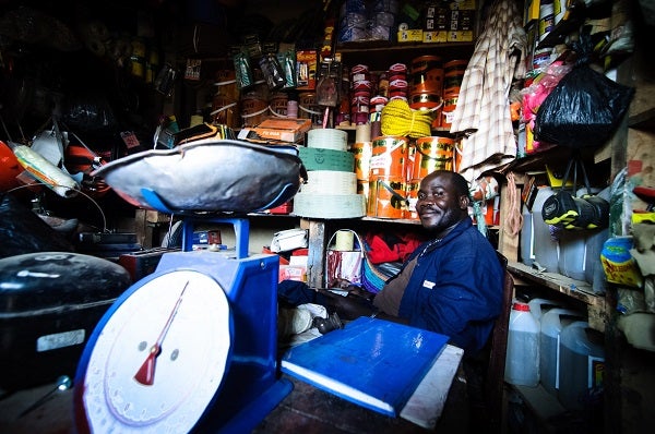 Store owner sitting in his shop