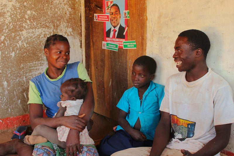 Mozambican family sitting together
