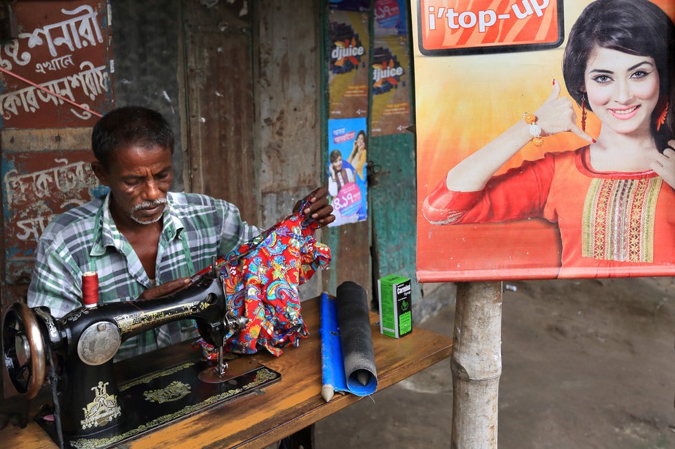 Man using a sewing machine