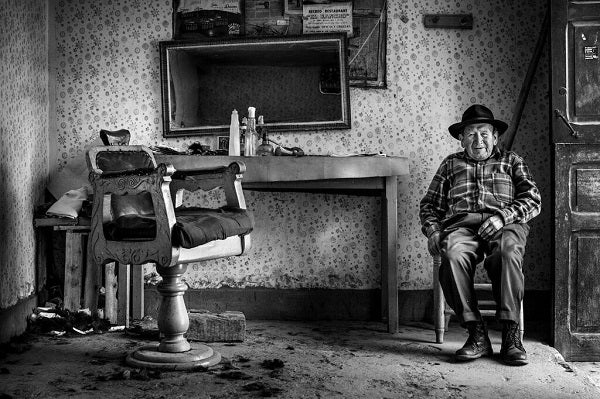This barber has worked in Peru for over 60 years.