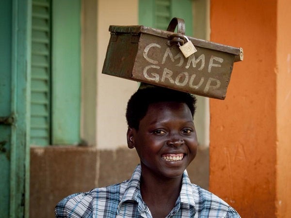 A woman smiles in Uganda