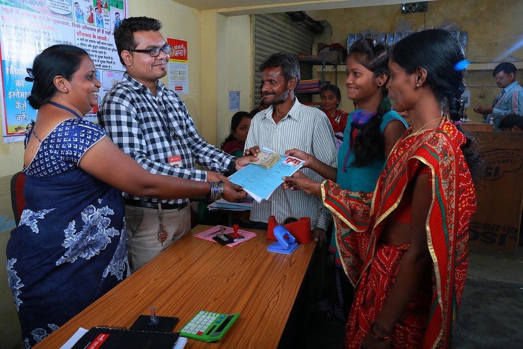 Women obtain education loans from ESAF Bank in India.