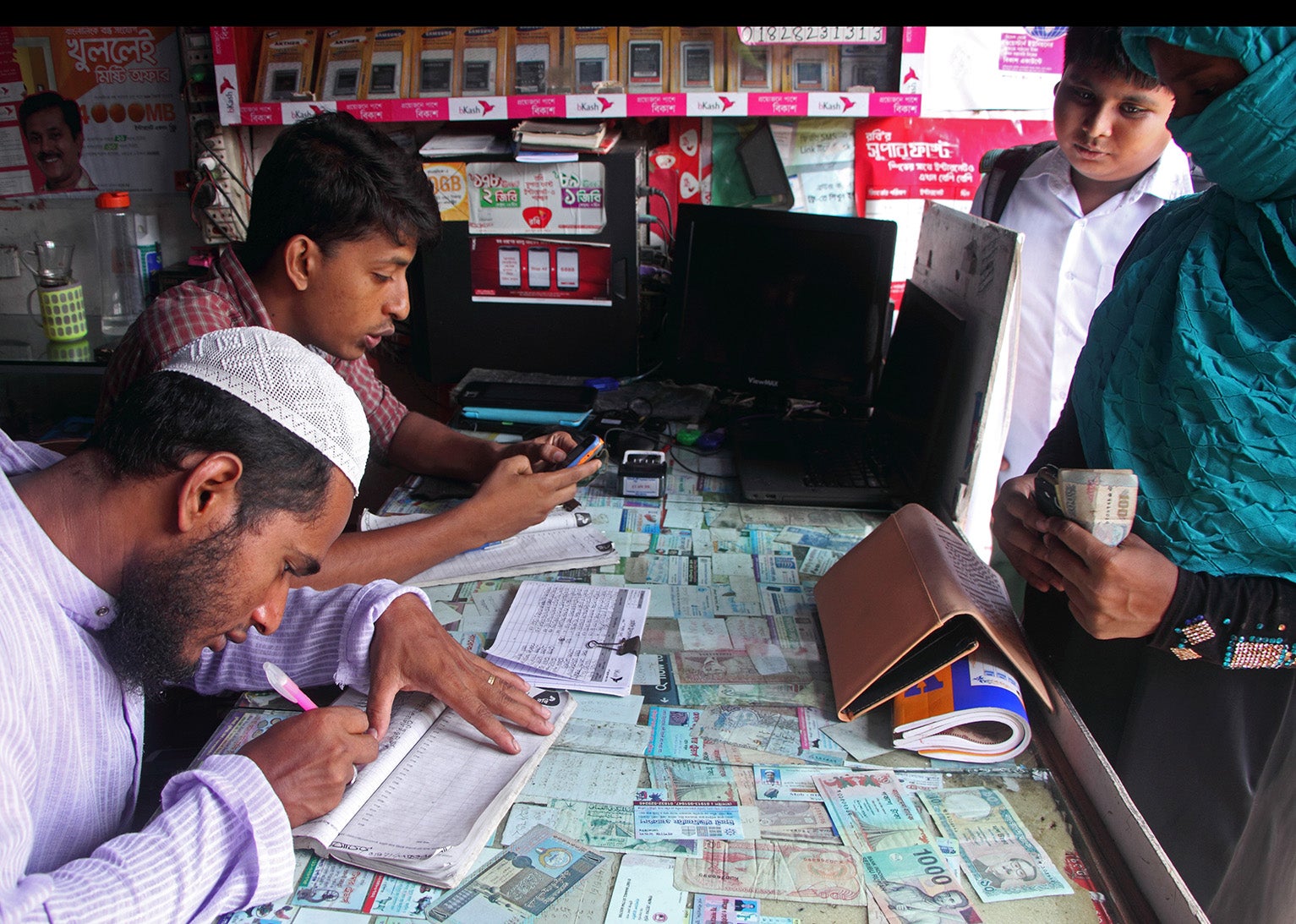 Like many mobile money agents in Bangladesh, this agent only does basic cash-in/cash-out transactions.