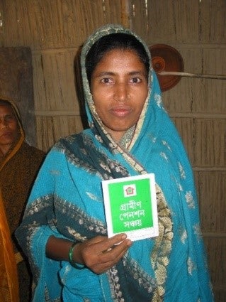 Rahima, one of the Microsave (MSC) diarists, holds her GPS passbook in 2004.