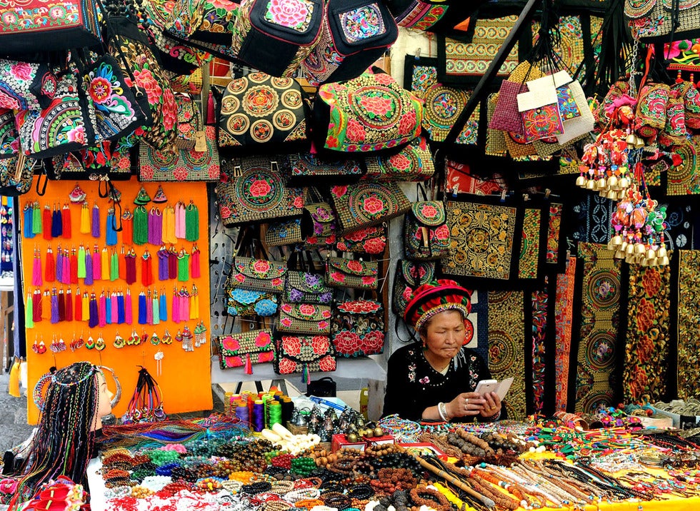 Ma Qin, 65, sells handicrafts in the city of Dali, China. Photo: Sudipto Das, 2015 CGAP Photo Contest