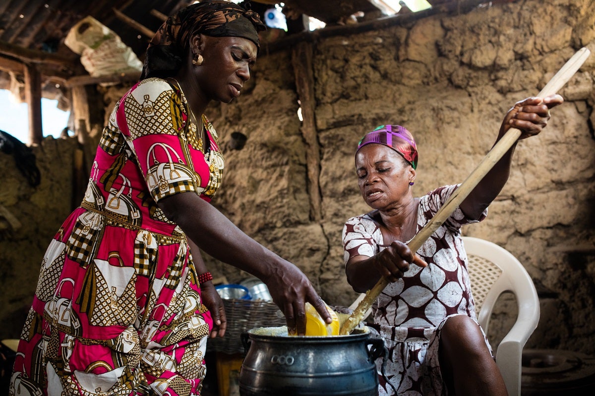 Women cooking with a clean cookstove in rural Ghana.