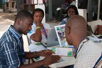 Tigo cash representative in Ghana. Photo by IDEO.org