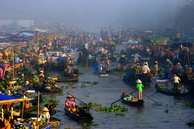 Vendors sell their wares in a floating market in Vietnam