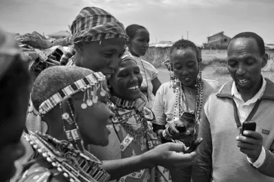 Masai people try mobile banking in Kenya