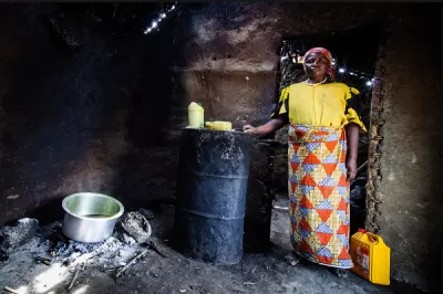 Woman standing in her home.