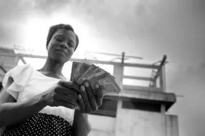 Woman receives loan in Ghana