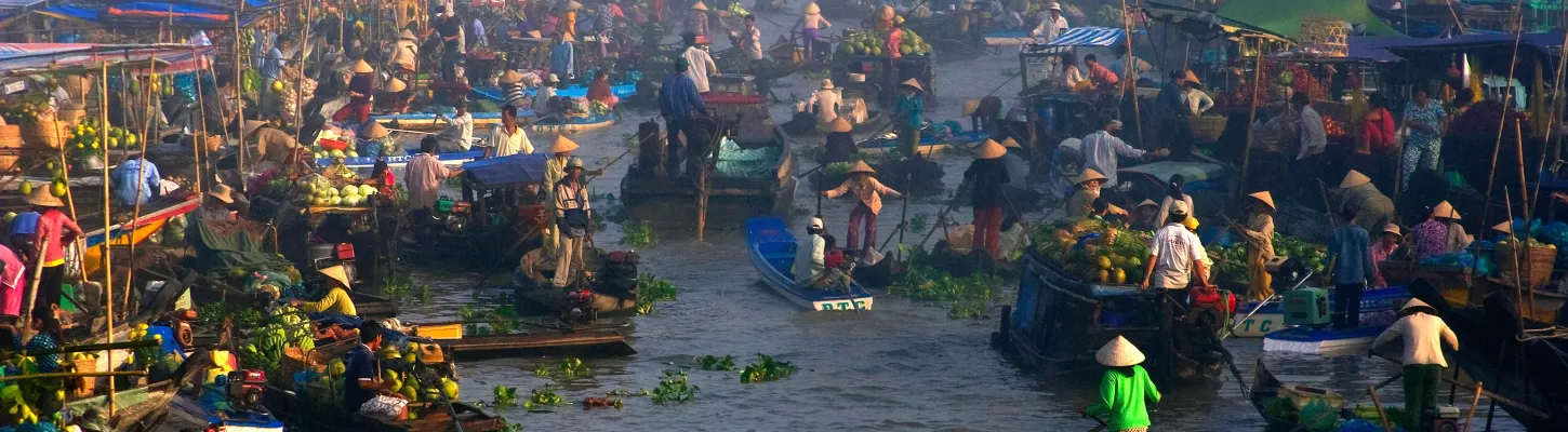 Small business owners in the floating market in Vietnam