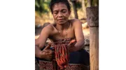 	Woman-dyes-thread-Indonesia-Photo-Debra-Wallace-2017-CGAP-Photo-