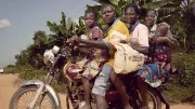 Taxi-moto driver in Benin with female passengers