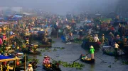 Vendors sell their wares in a floating market in Vietnam