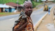 Man on the street in Kailahun, Sierra Leone | Credit: George Lewis, The World Bank