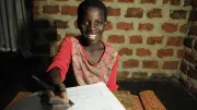 Child-studying-with-solar-lamp