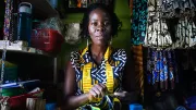 Ugandan-woman-sewing-Mohammad-Saiful-Islam-2013-CGAP-Photo-Contest