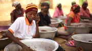 Woman talking on phone, Ghana