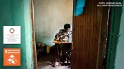 Woman sews in Rwanda