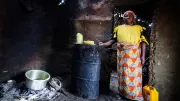 Woman standing in her home.