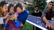Smartphones and solar panels. Photo Left: Anindya Majumdar, 2017 CGAP Photo Contest. Photo Right: Dominic Sansoni, World Bank