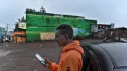 An Uber driver in Nairobi, Kenya, looks for riders on his app.